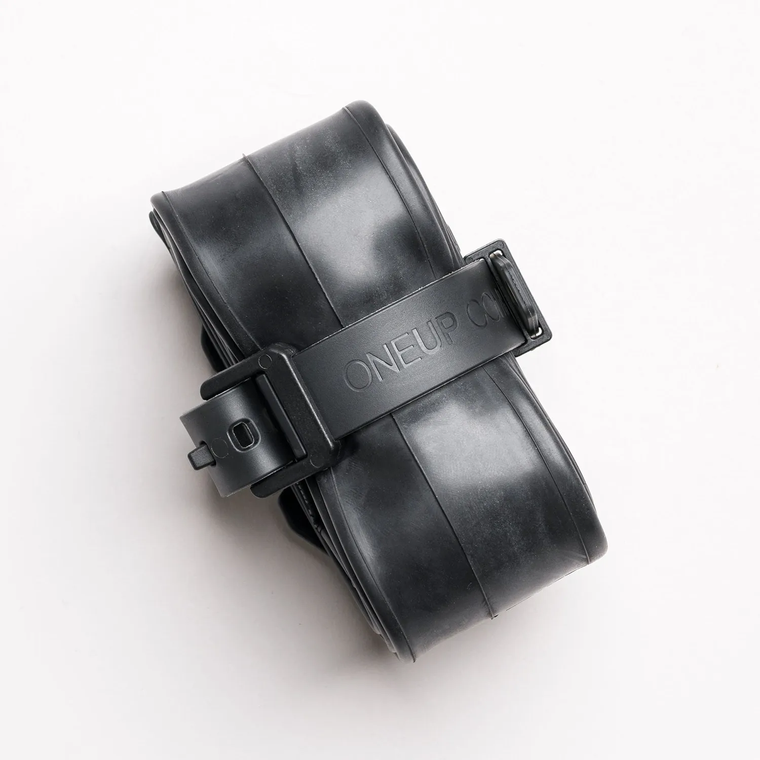 OneUp EDC Tube Strap holder med rem